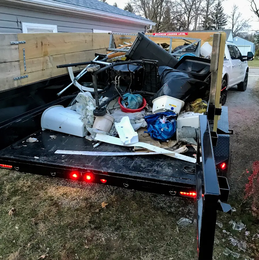 Roll-off dumpster delivered to a residential driveway in Van Buren